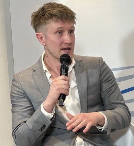 Austin Ambrozi speaking in Davos, Switzerland during the annual World Economic Forum (WEF).